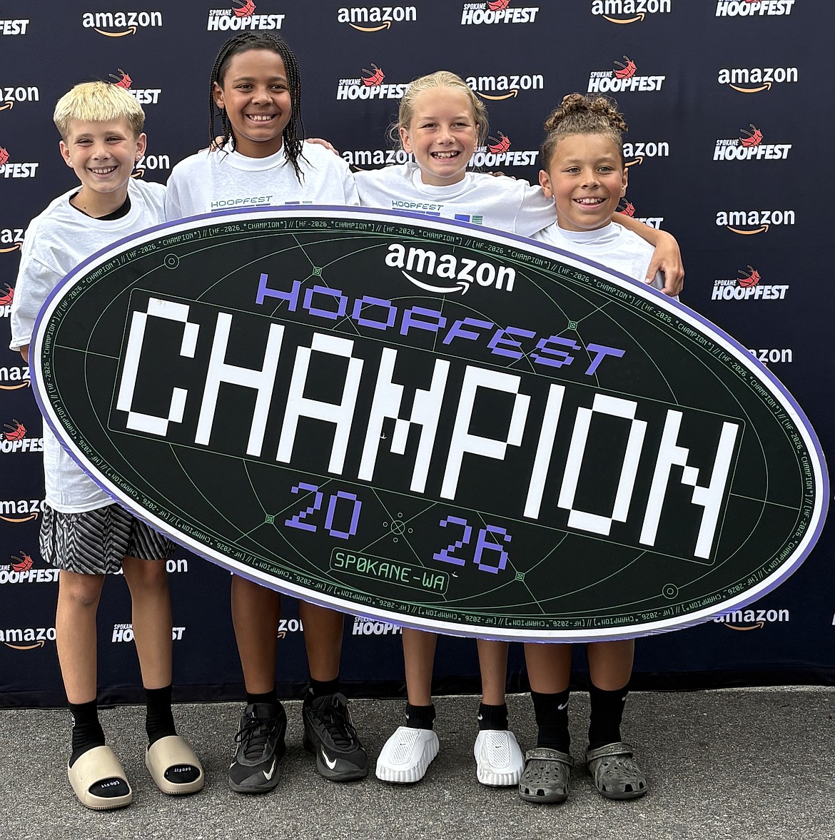 Courtesy photo
Team Upstate, with players from Coeur d'Alene and Post Falls, won its fourth grade bracket at Hoopfest last weekend in downtown Spokane. From left are Jameson Beierle, Amari Lockett, Boone Eberlin and Josiah Donison.