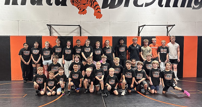 Attendees of the Tigers wrestling camp, including EHS wrestlers and youth wrestlers from around the Basin come together for a group picture.