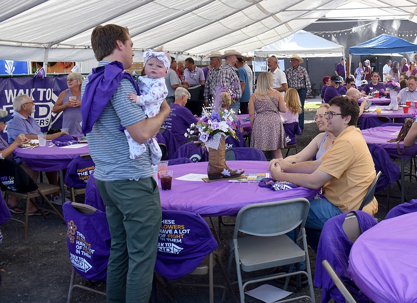 Attendees at a past Purple Party socialize and build their teams for the Walk to End Alzheimer’s. This year’s party is July 16 at Brookdale Hearthstone in Moses Lake.