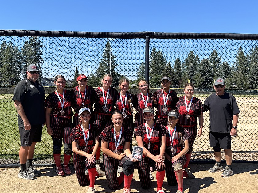 The Washington Rage lines up for a team photo. Front Row, Isabella Suarez, Malorie Lane, Claire Michelbook and Amaiah Martinez. Back Row, Head Coach Bob Richardson, Taylor Peterson, Kylie Christiansen, Rayna Waters, Allie Jensen, Josie Carlstrom, Kylah Young, Brooklyn Bruce and Assistant Coach AJ Lane.