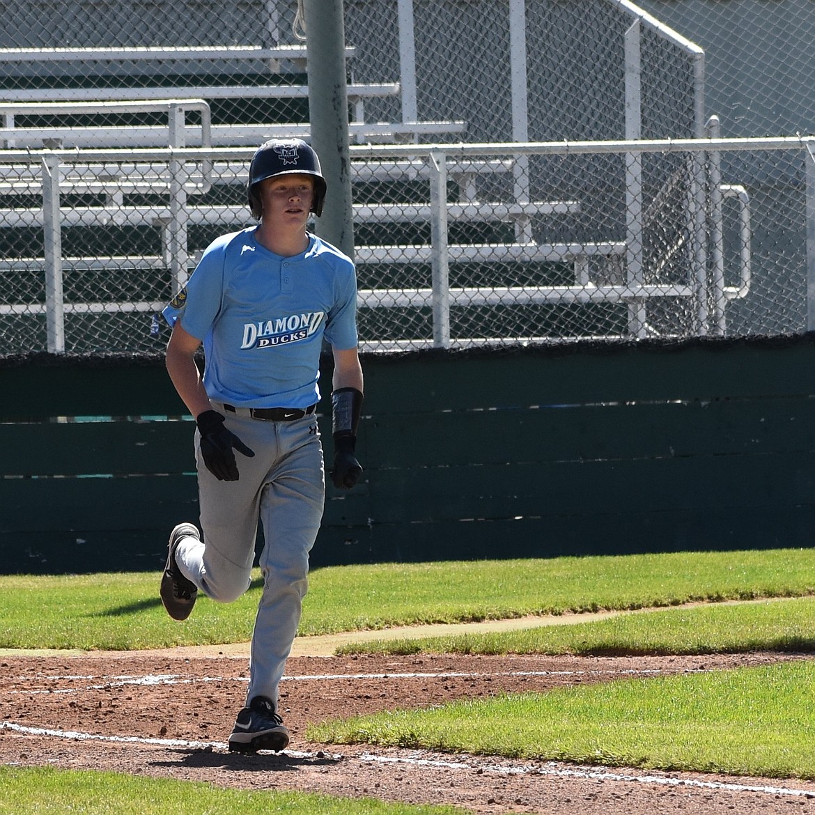 ACH’s Cade Carstensen makes his way to first base during the postseason in the Tillage League.