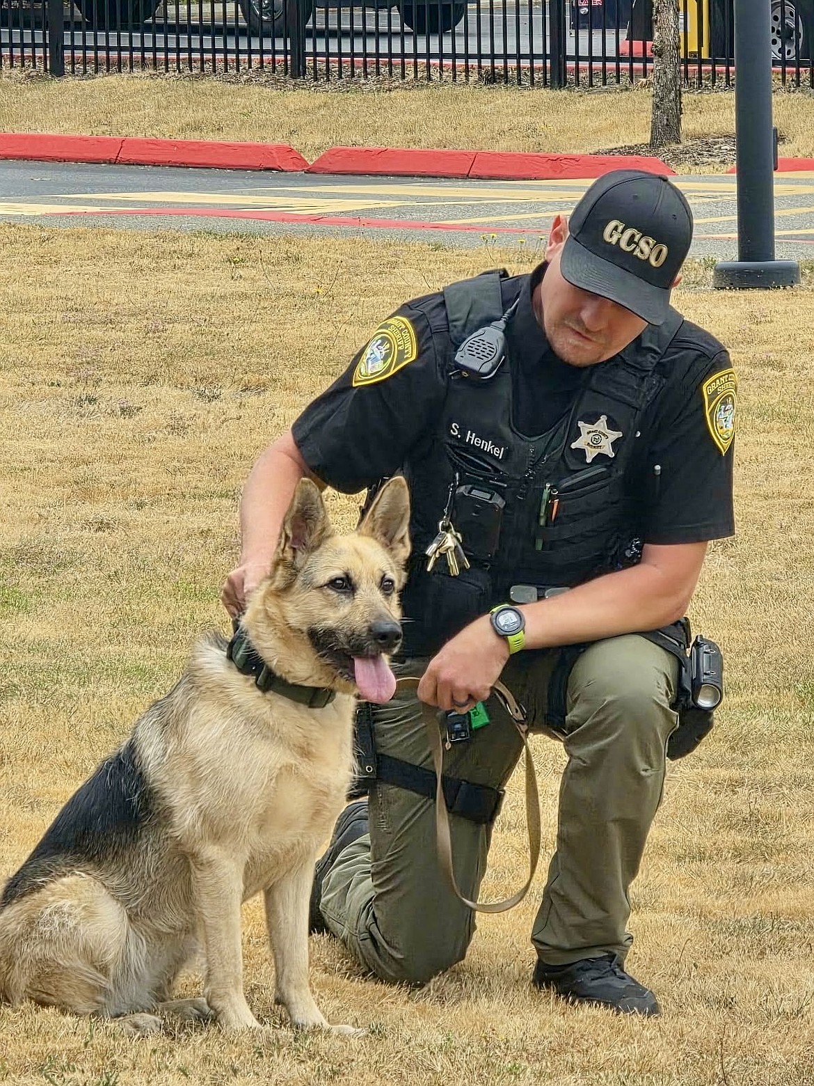Grant County Sheriff’s Office Deputy Seth Henkel stands alongside the newest member of the sheriff’s office, K-9 Nova. Nova was a stray at the Multnomah County Animal Services before she was found by trainers at Washington State Department of Corrections and chose to be trained as a drug detection K-9.