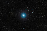 Faint new planet is revealed around a young star after a decade in hiding