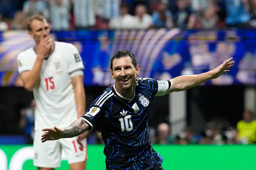 Argentina's Lionel Messi celebrates after teammate Enzo Fernandez scored their side's first goal during the World Cup semifinal soccer match between England and Argentina in Atlanta, Wednesday, July 15, 2026. (AP Photo/Rebecca Blackwell)