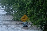 At least 1 person has died as Texas flooding forces evacuations and rescues, governor says