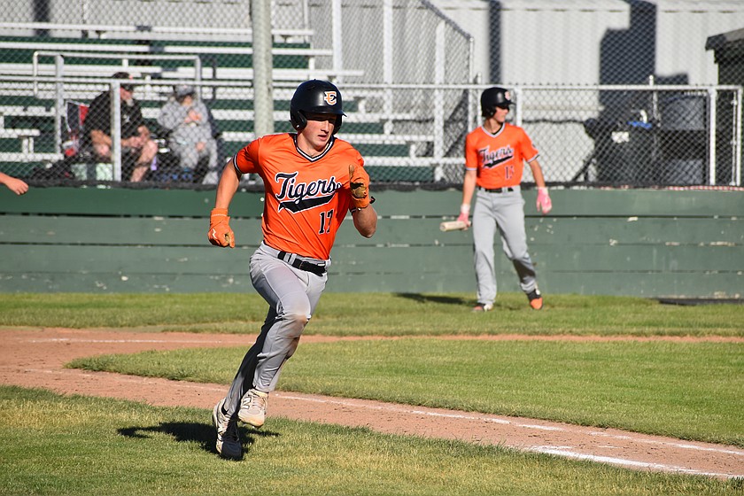 Mitchell Johnson (17) sprints toward first base after hitting the ball into the outfield earlier this season. Johnson and teammate Isaiah Davis (not pictured) were selected to the Tillage League All-Star 18U team.