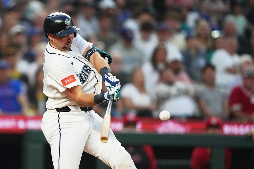 Seattle Mariners' Cal Raleigh hits a grand slam against the Cincinnati Reds during the seventh inning of a baseball game, Monday, July 20, 2026, in Seattle.