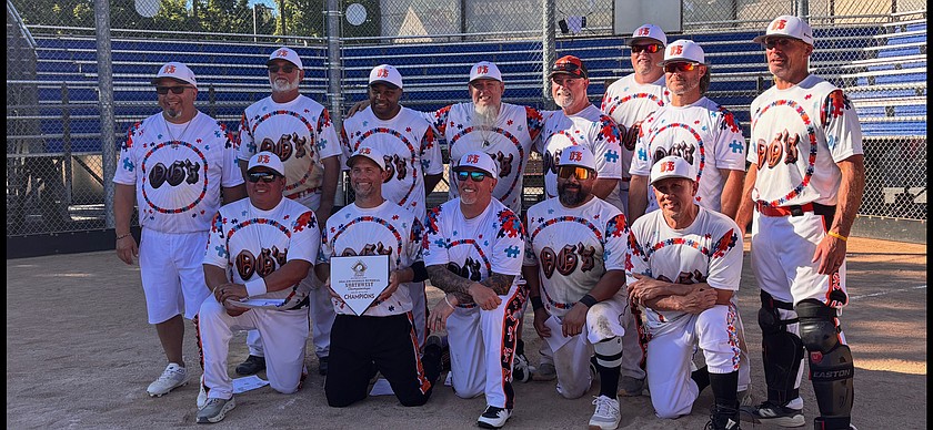 From left kneeling: Head Coach Rudy Perales, Erik Sundet, Shon Schreiber, Lalo Rivera, William Lovell. From left standing: Assistant Coach Leo Carlos, Pat McGuire, Derrick Smith, Todd Lee, Bart Knoll, Clint Kruse, Andy Moore and Treavor Bodle.