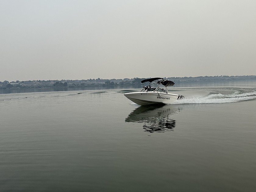 On a hot summer day, the best place to be is with the kids wakesurfing on Moses Lake as this family was heading out to do.