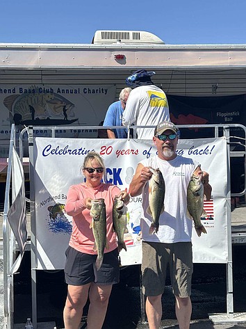 Roni, left, and Andy Smith of Moses Lake show their catch at Potholes Reservoir.