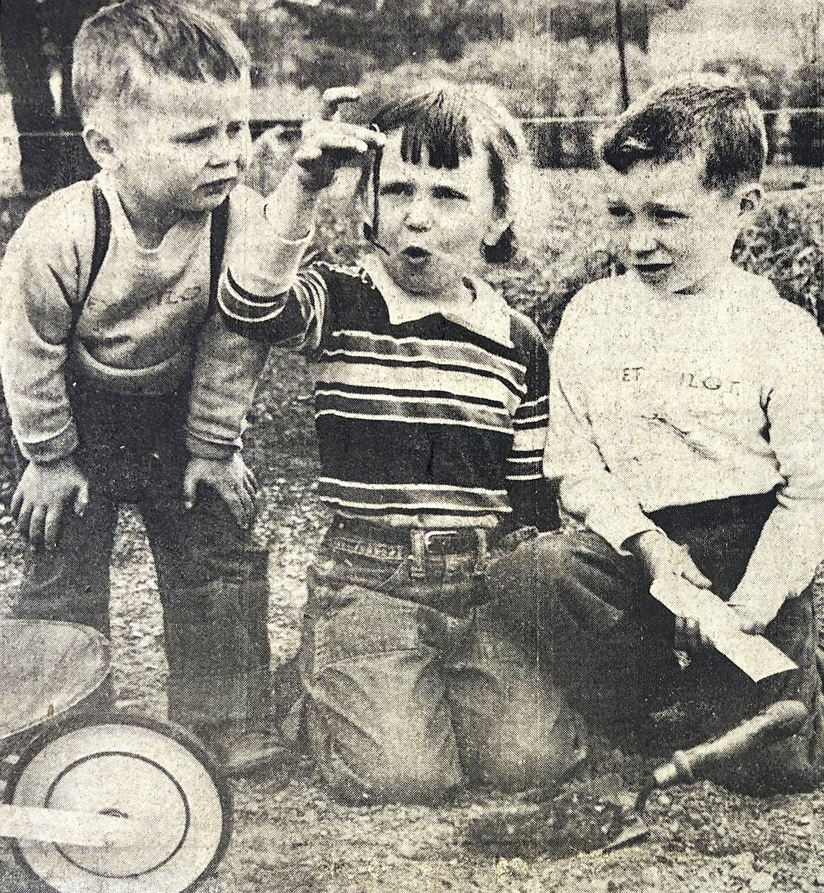 In 1956, the Gavin children (from left): Mike, age 3, Norma, 5, and Billy, 6, reacted to a large earthworm.