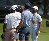 SHOWCASE GOLF: Blue jacket today, Gold jacket soon ... Former NFL star Fitzgerald wins Epic Shot contest on first day of annual cancer fundraiser at Coeur d'Alene Resort Golf Course