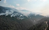 Crews gain ground on Upper Smith Fire