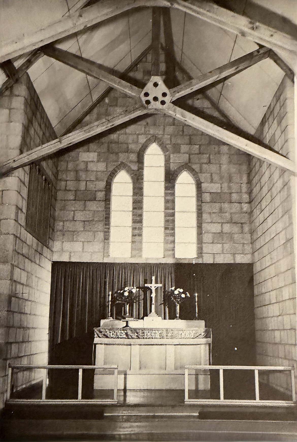 The sanctuary and altar of Holy Trinity Church in 1949, two years after the building at 10th Avenue and C Street Southwest, where the church still meets, was completed.