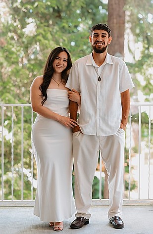 Marian Painting LLC owner Simon Ribellia (right), and his fiancée Lesley (left). Simon started his painting business at just 20 years old working out of a Prius but three years later he has around 15 employees, four vans and multiple painting crews.