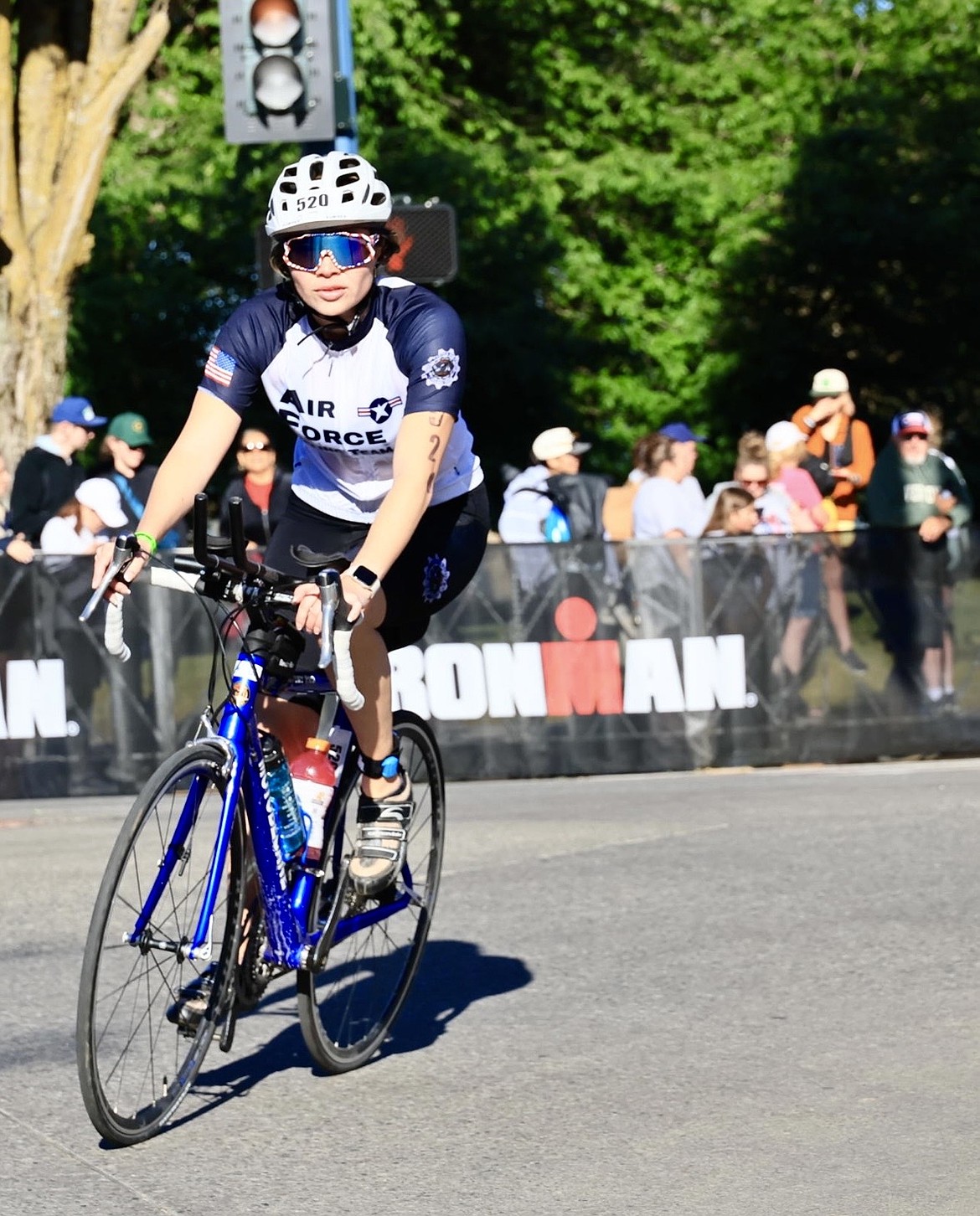 Courtesy photo
Hailey Jackson, a 2014 graduate of Lake City High, competes during the bike portion of June's Ironman 70.3 Coeur d'Alene.
