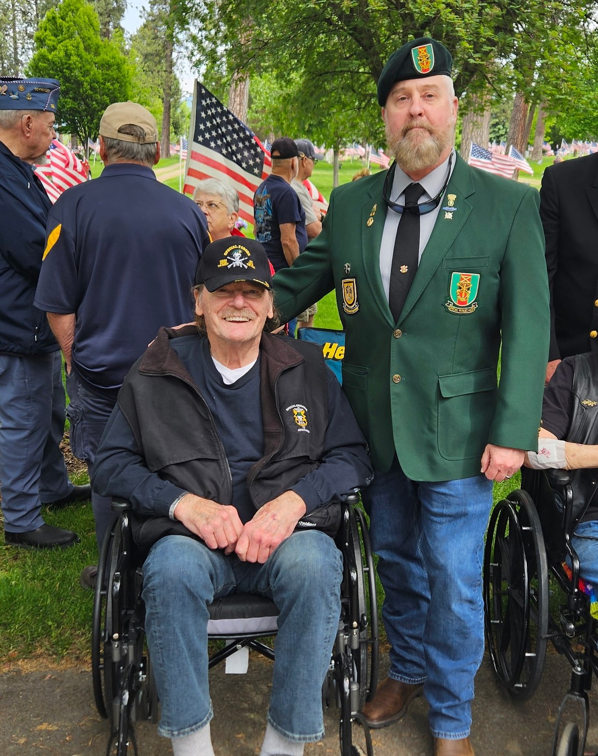 Terrence W. Smith and Stephen Durfee pose for a photo at a veterans event.