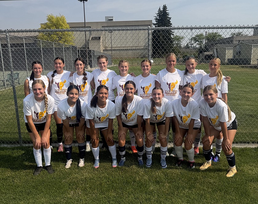 The Mavs’ girls soccer players huddle up for a group photo at the Eastern Washington University soccer camp. The Mavs attended the three day camp where they got to learn from college coaches and players while also bonding as a team.