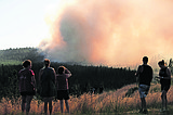Wind-driven wildfire prompts evacuations in Spokane