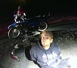 Man arrested near burglary scene with firearm