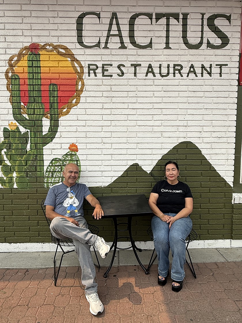 Husband and wife restaurateurs Suced Yusso (right) and Luis Guerrero stand in front of the Cactus restaurant on South Division Street, which had a soft opening on July 15. It is open Tuesday through Saturday 11 a.m.-7 p.m.
