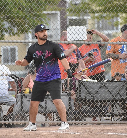 A player from The Kids steps up to bat during the championship game earlier this summer.