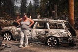 Firefighters get a handle on Spokane wildfires as tens of thousands remain evacuated