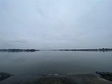 Bystander pulls man from truck in water at Blue Heron boat launch