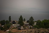 Canada puts the military on standby as British Columbia wildfires kill 1 and displace thousands