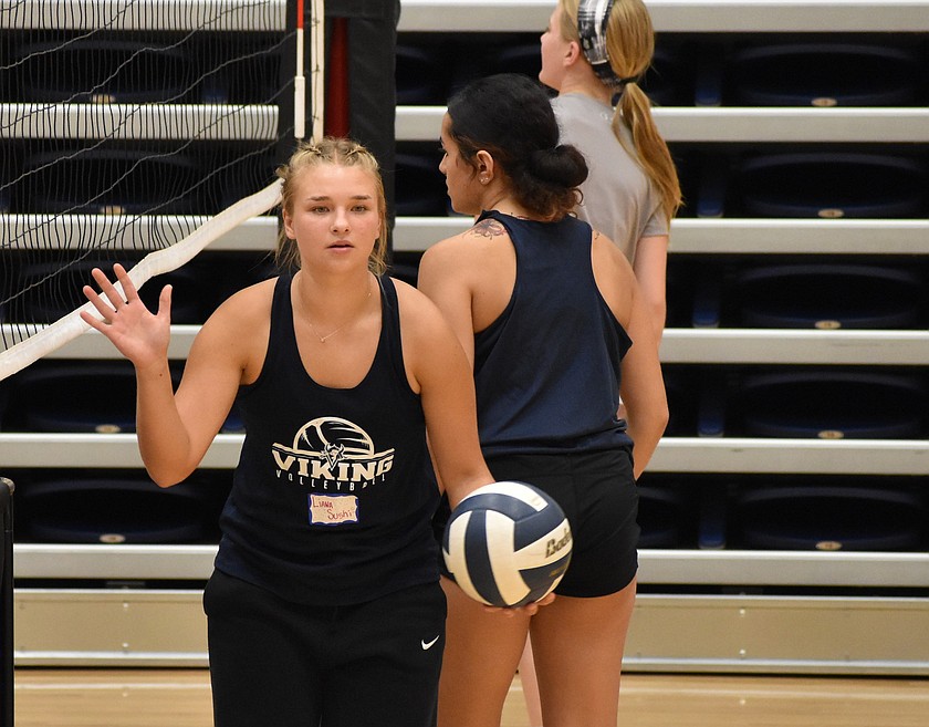 Liana Sushik, now wearing Vikings attire, gets ready to toss the ball into the air for a high school player during the BBCC volleyball camp Wednesday. Sushik came full circle getting to coach young athletes at the very camp that gave her the opportunity to play for Big Bend.