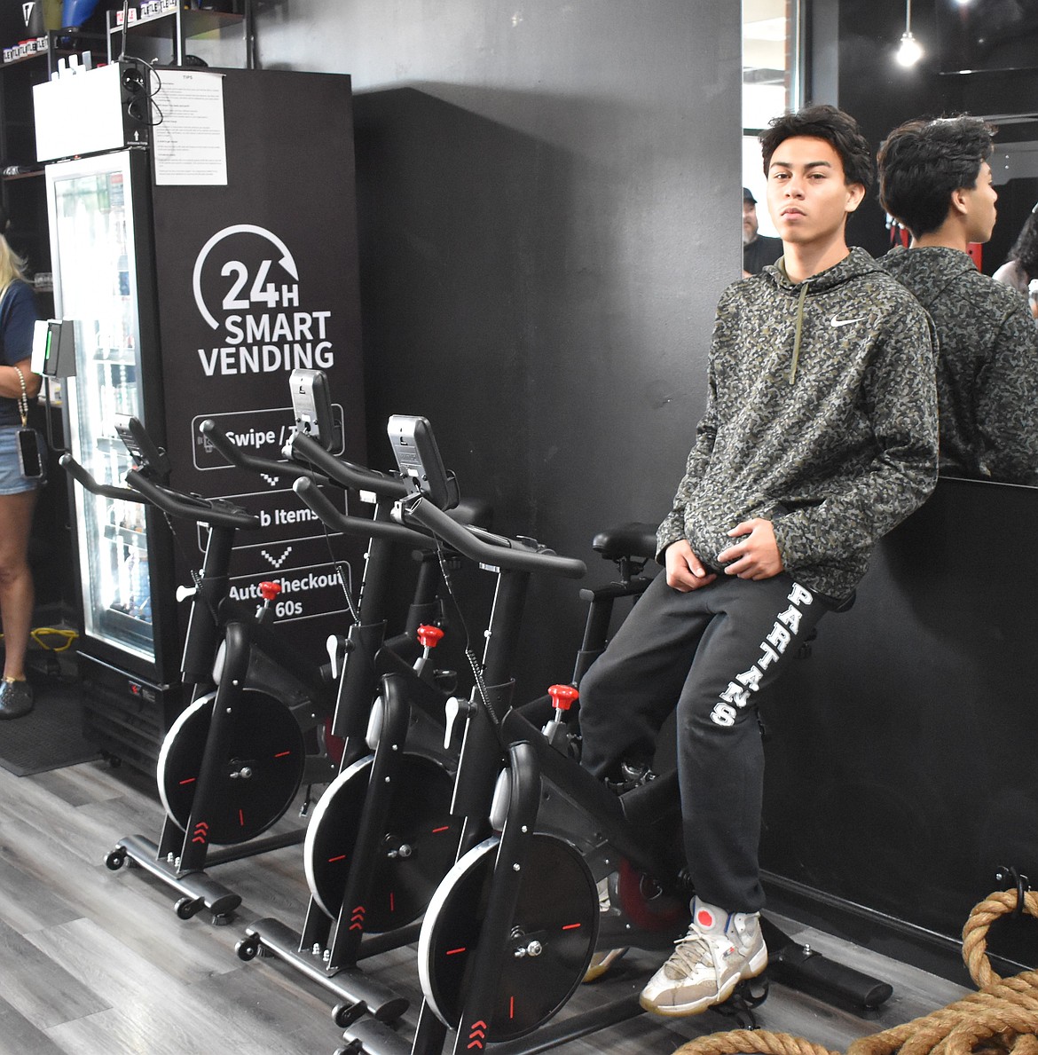 One of the gym’s first students, Armani, sits on one of the ellipticals along the wall at Hamman Boxing. The gym has already started gaining traction with two students already signing up as soon as they could.