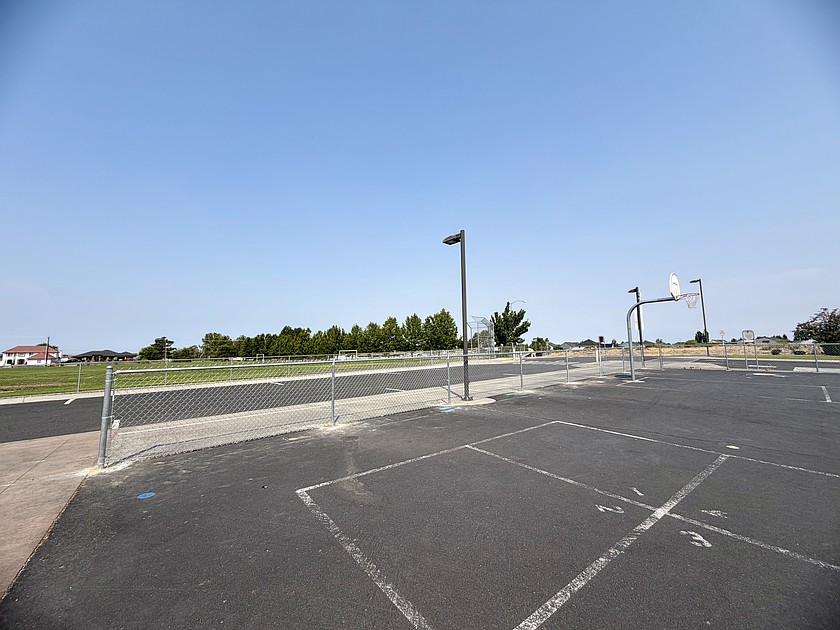 Moses Lake School District partnered with Moses Lake Home Depot and Cortez Fencing to install a fence between Sage Point Elementary School’s blacktop and the roadway. The district received a grant from Home Depot to cover material costs, and Cortez Fencing donated time and equipment to install it.