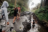 Muddy cleanup ahead as Tropical Storm Lala moves west of Hawaii