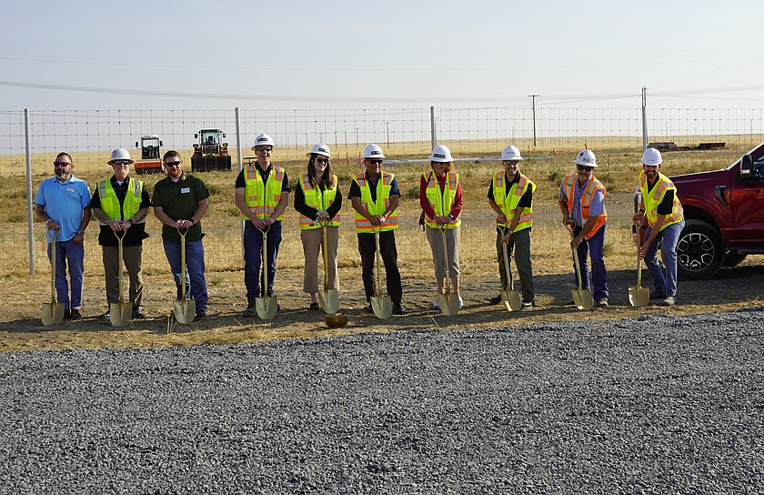 Invenergy, elected leaders, and labor representatives prepare to wield their golden shovels at the groundbreaking of the Quincy Solar Energy Center Tuesday. From left: Russell Walker, IUOE Local 302; Nate Mack, LiUNA Local 348; Jeremy Chase, IBEW Local 191; John O'Connell, Invenergy; Chandler Cornwell, Invenergy; Washington State Representative Alex Ybarra; Washington State Senator Judy Warnick; Mateo Gomez, Invenergy; Bob Allen, IBEW Local 191; and Bly Rougier, Invenergy.