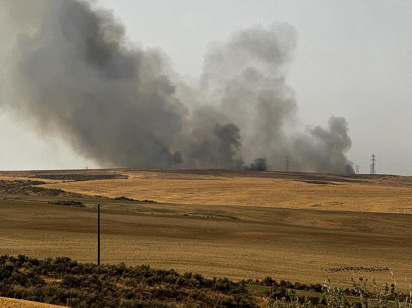 Smoke billows above a fire north of Quincy last year. The National Weather Service has warned that the risk of fire is high this weekend in eastern Washington, including the Columbia Basin.