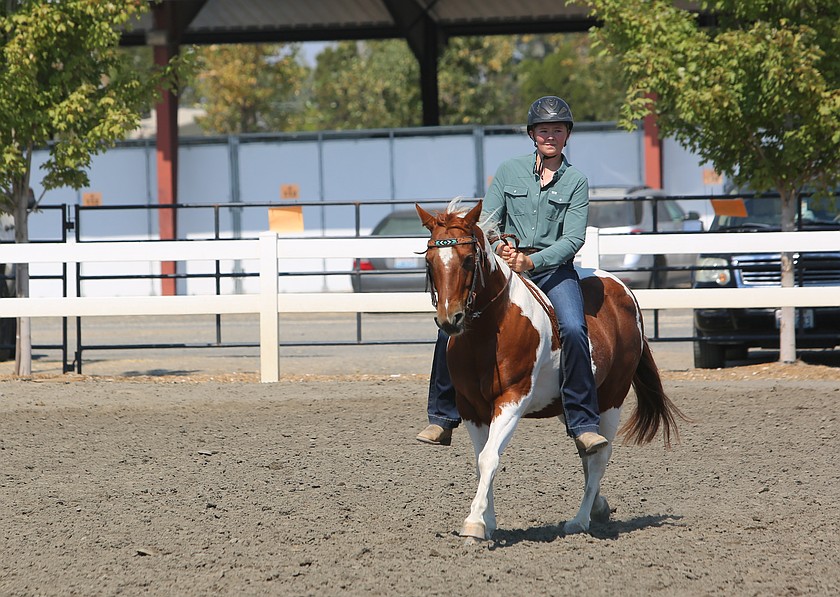 A GCYEP competitor practices their routine outside the Harwood Pavillion ahead of their competition at the Grant County Fair.