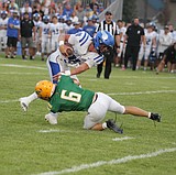 Stern showing ... Senior quarterback accounts for four touchdowns as Coeur d'Alene handles Lakeland in opener