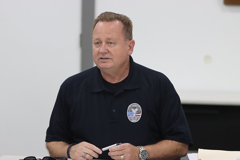 Spirit Lake Chief of Police Michael Morlan speaks with his citizens.