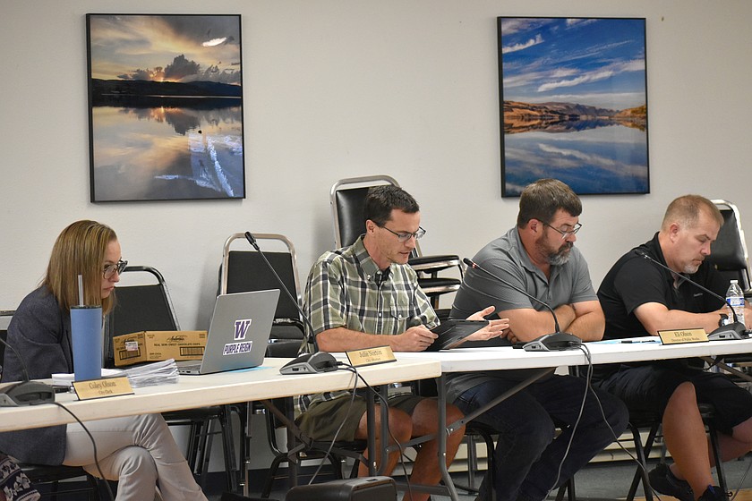 Soap Lake City Planner Alex Kovach (second from left) speaks during the Aug. 19 meeting. Council members voted at the meeting to appoint five members to the tourism committee.