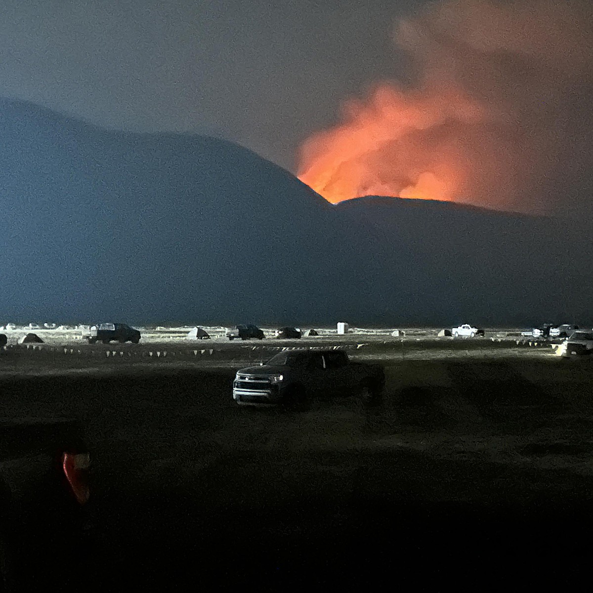Crews battle storm-sparked fires