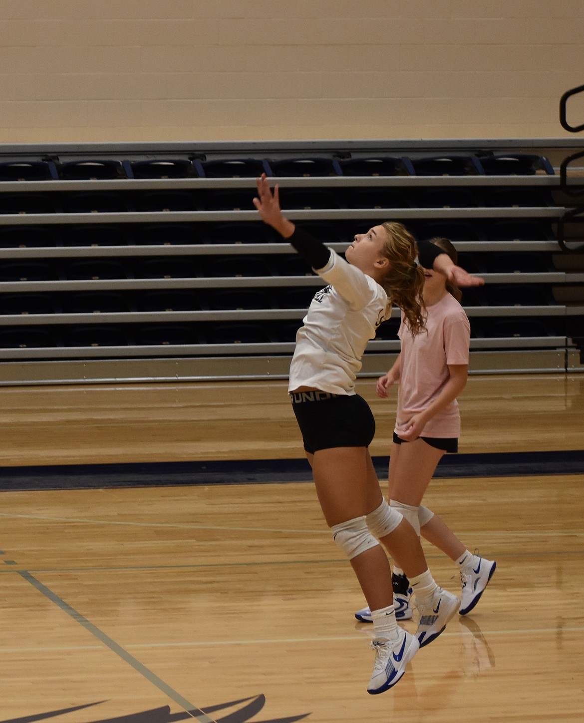 Liana Sushik, a freshman at BBCC, prepares to slam the ball over the net at practice during the preseason.