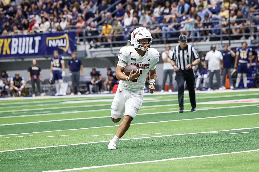 Eagles quarterback Nate Bell (2) breaks loose for a designed run against Northern Arizona, Saturday. Bell threw for a career high 307 yards and two touchdowns despite Eastern Washington suffering a 34-27 loss to open the 2026 season.