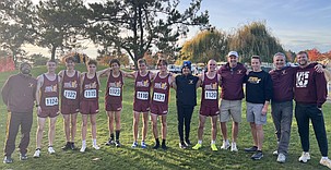 The Mavericks boys cross country team takes a team photo at the 4A state cross country meet last season. Head Coach Larry Dagnon and the Mavs are aiming for higher finishes at state this year, he said.