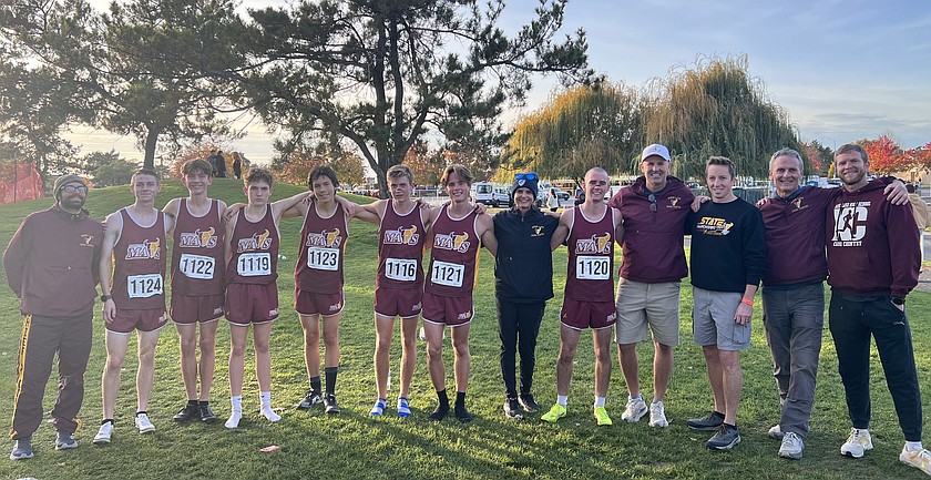 The Mavericks boys cross country team takes a team photo at the 4A state cross country meet last season. Head Coach Larry Dagnon and the Mavs are aiming for higher finishes at state this year, he said.