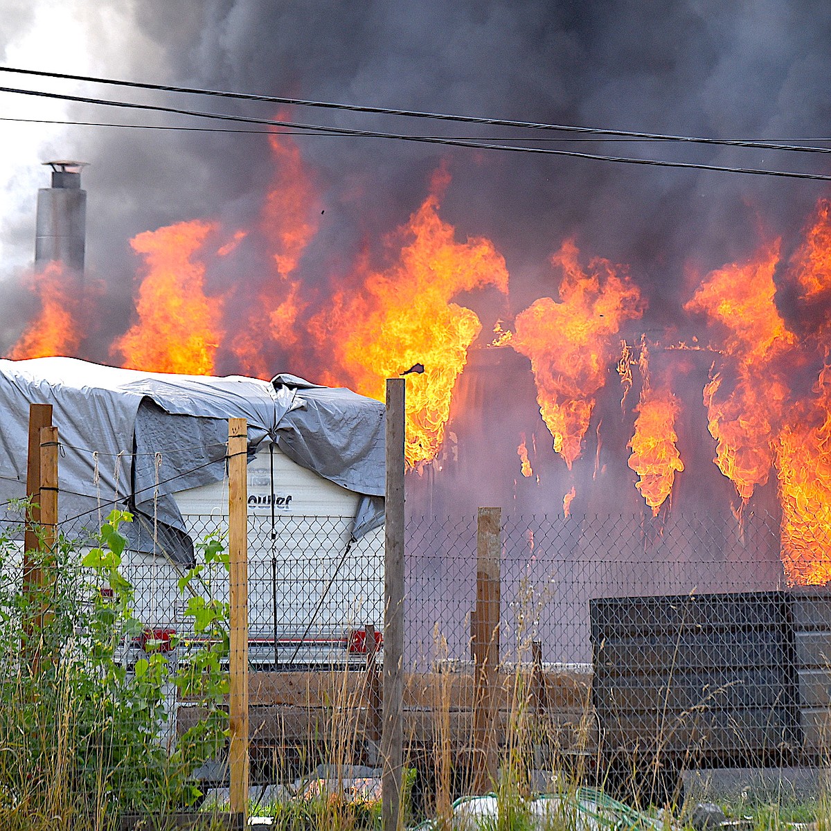 Two Libby men hospitalized in structure fire