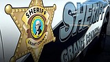 Son booked into jail for suspected murder after father found dead near Moses Lake