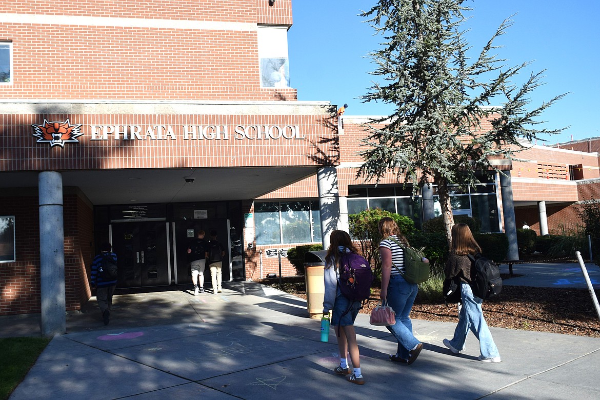 Ephrata High School students walk from the 1937 Beezley Annex back to the main campus on the first day of school Thursday.