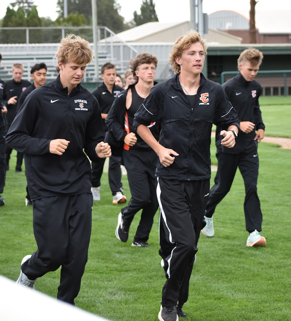 A group of boys from Ephrata’s cross country team complete a lap around Johnson-O'Brien stadium.