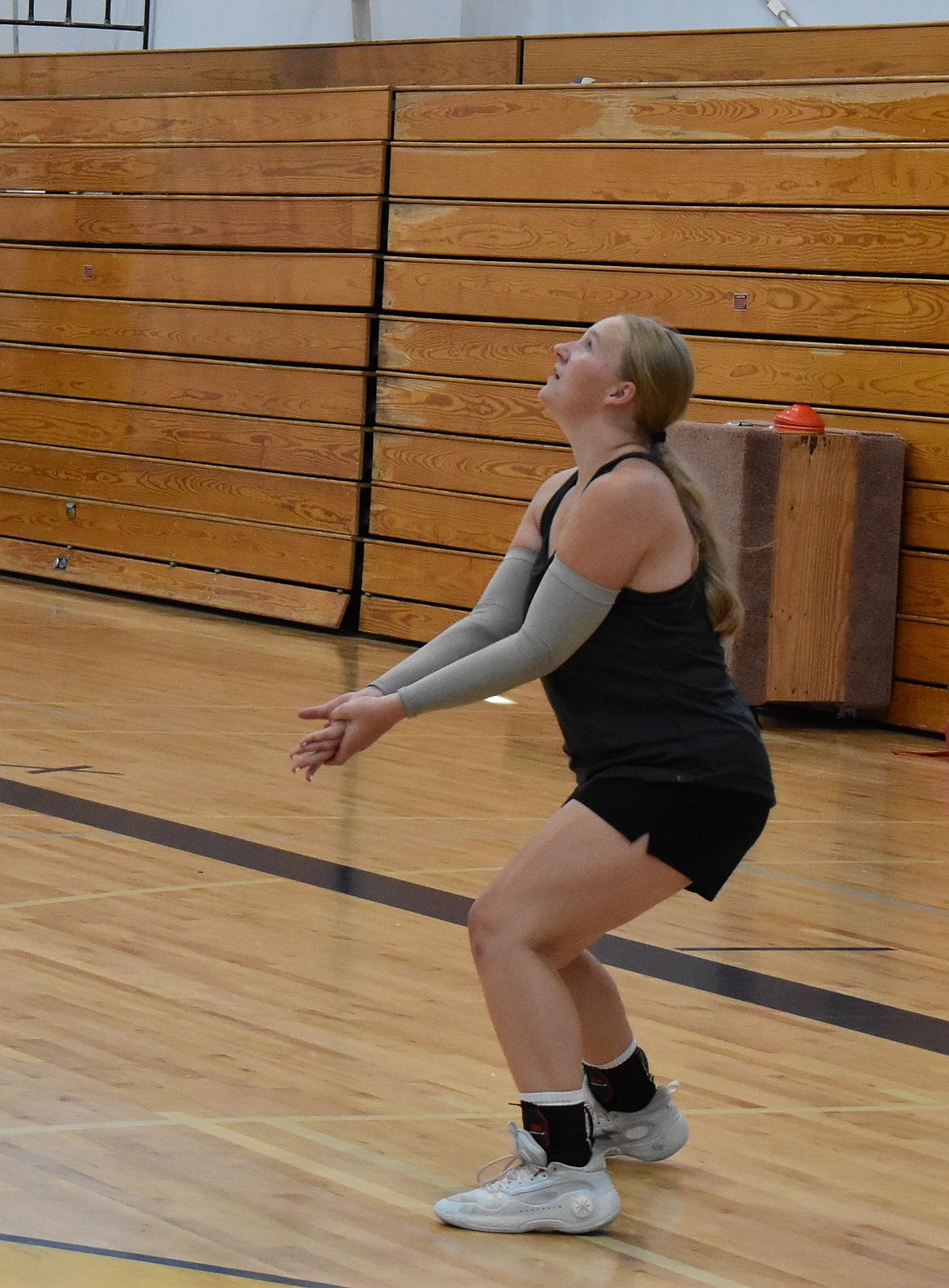 Abby Stanley, a senior from the Lions, keeps her eye on the ball at practice early in the season.