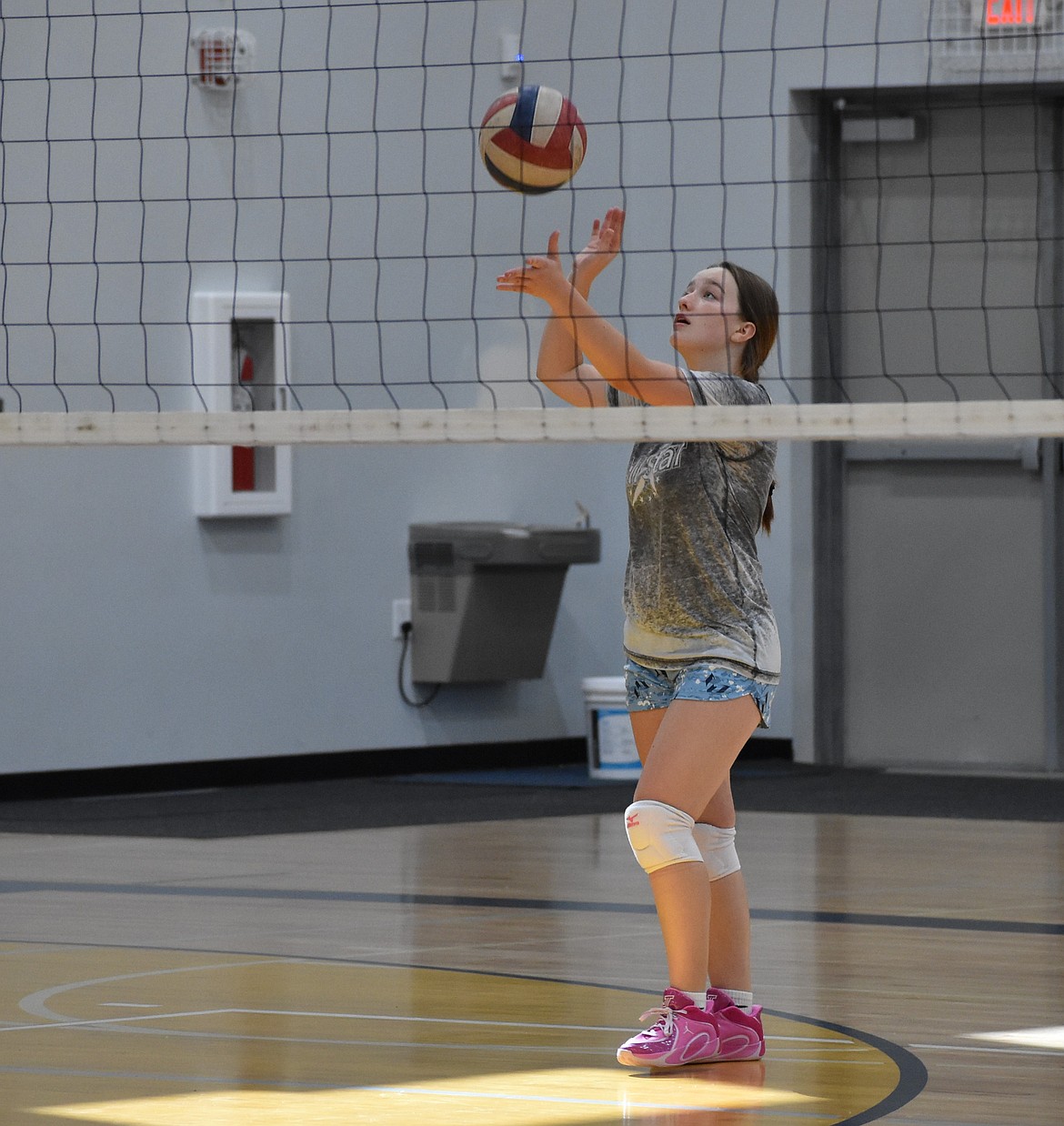 MLCA’s Vesta Koethke prepares to serve during a practice match against her teammates early in the season.